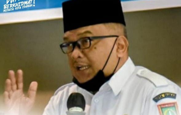 Kepala Diskominfotiksan Dumai, Drs. H. Khairil Adli, M.Si.